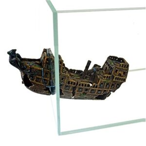 Dekoracija laivas išlendantis iš akvariumo